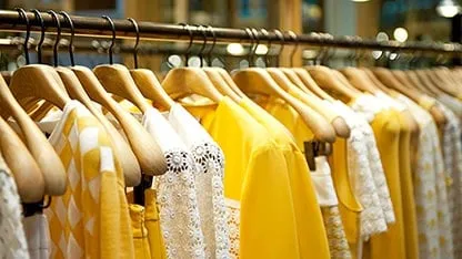 Sản phẩm retail rack of yellow clothes card — Công Ty TNHH Intertek Việt Nam — MST 0100773892