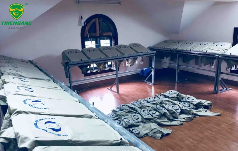 Sản phẩm in quan ao bao ho — Công Ty Cổ Phần Quốc Tế Thiên Bằng — MST 0104518734