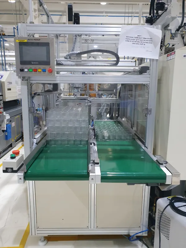 Sản phẩm mca may tu dong cap san pham vao tray206 jpg — Công Ty TNHH Sản Xuất Và Thương Mại MC Việt Nam — MST 0106667523