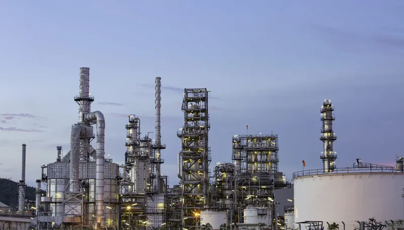 Sản phẩm twilight scene oil refinery plant storage white tank oil petrochemistry scaled e1776486090246 — Hạt Nhựa TLD - Công Ty Cổ Phần TLD Việt Nam — MST 0107571302