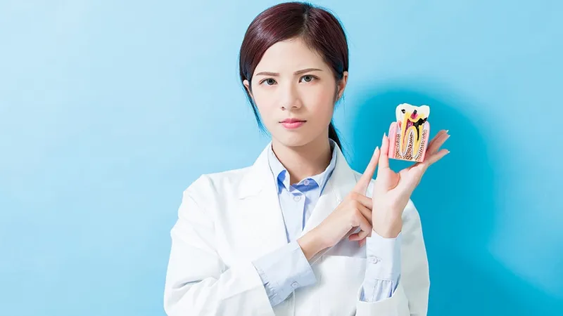 Sản phẩm woman dentist take decay tooth model — COLGATE-PALMOLIVE - Công Ty TNHH COLGATE-PALMOLIVE (Việt Nam) — MST 0300546015