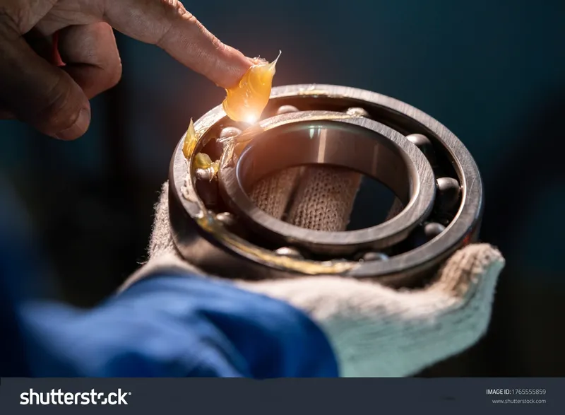 Sản phẩm trang_chu total mobo photo mechanic is putting yellow grease in the into bearing engineering and industrial concept 1765555859 transformed — Dầu Nhớt Nguyên Đan - Công Ty TNHH Thương Mại Dịch Vụ Nguyên Đan — MST 0307853946