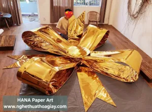 Sản phẩm NƠ VÀNG KHỔNG LỒ_300x300 — Công Ty TNHH Thương Mại Đầu Tư HANA — MST 0311894166
