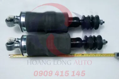 Sản phẩm Phuộc bầu hơi cabin 380x253 — Công Ty TNHH Thương Mại Ô Tô Hoàng Long — MST 0312211334