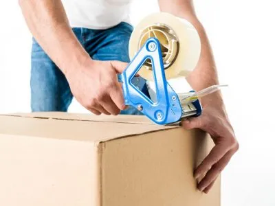 Sản phẩm crello 138793112 stock photo man packing box scaled 400x300 — Công Ty TNHH Vận Tải Và Chuyển Phát Nhanh An Phú — MST 0315638607