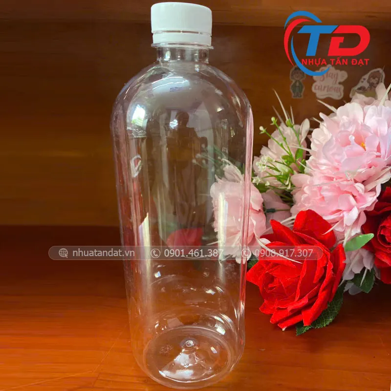 Sản phẩm nhua tan dat chai sua 1lit tron 1 — Bao Bì Nhựa Tấn Đạt - Công Ty TNHH Sản Xuất Bao Bì Nhựa Tấn Đạt — MST 1102060899