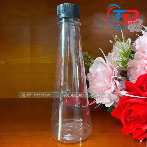 Sản phẩm nhua tan dat chai sua 330ml tam giac 1 600x600 — Bao Bì Nhựa Tấn Đạt - Công Ty TNHH Sản Xuất Bao Bì Nhựa Tấn Đạt — MST 1102060899