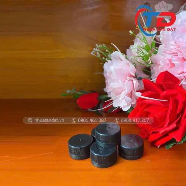 Sản phẩm nhua tan dat nap chai tra sua phi 30 1 600x600 — Bao Bì Nhựa Tấn Đạt - Công Ty TNHH Sản Xuất Bao Bì Nhựa Tấn Đạt — MST 1102060899