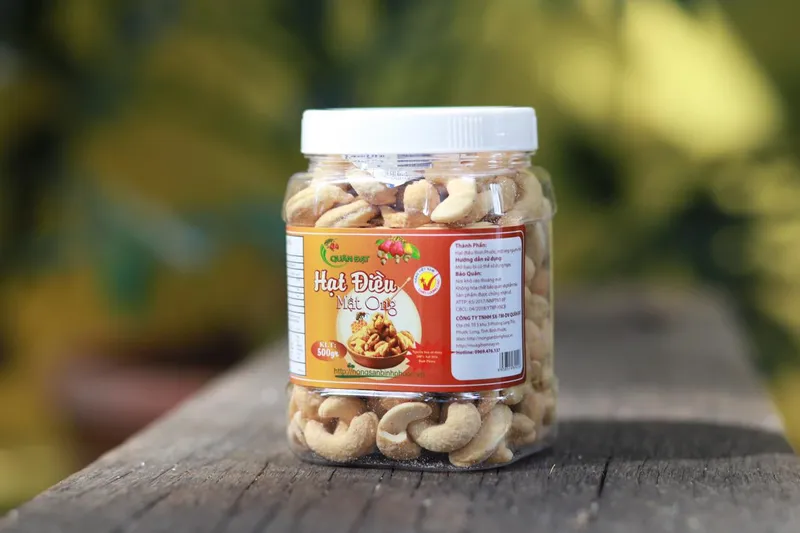 Sản phẩm hat dieu mat ong 500gr4 — Hạt Điều Quân Đạt - Công Ty TNHH SX TM DV Quân Đạt — MST 3801129240